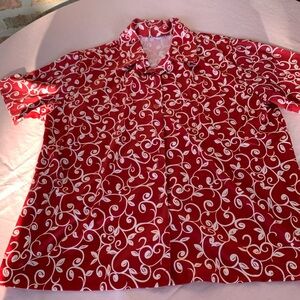 Front buttons up red shirt in Large with beautiful design as shown. No tags